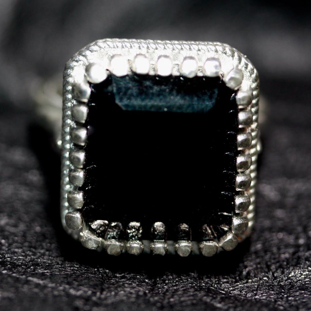 A Back to Black Tudor Throne Ring