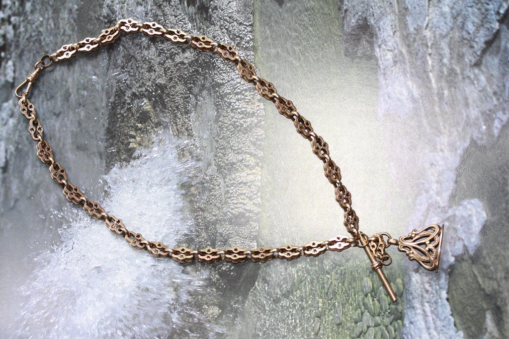 A RARE GEORGIAN 9CT GOLD HAND CUT NECKLACE WITH Victorian 9CT FOB ADDITIONS.