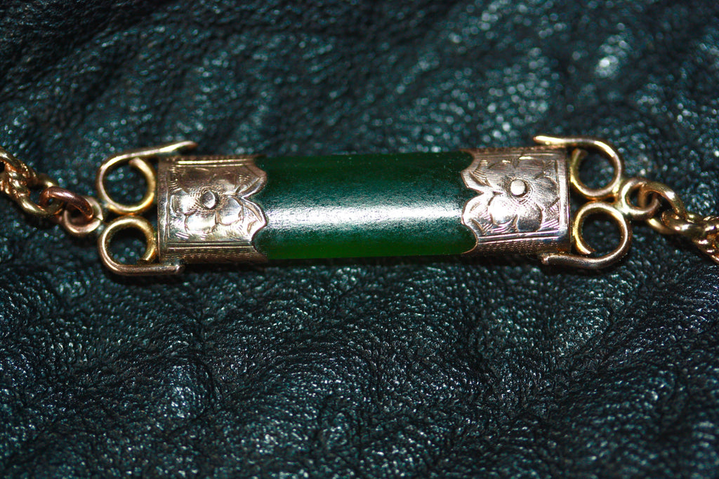 Gold Fob necklace with Pounamu Heart.