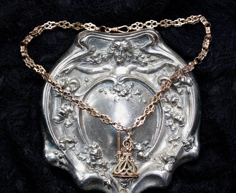 A RARE GEORGIAN 9CT GOLD HAND CUT NECKLACE WITH Victorian 9CT FOB ADDITIONS.